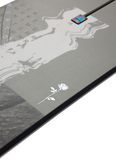Close-up of Burton Instigator snowboard topsheet with detailed white rose artwork and subtle gray textures, emphasizing craftsmanship and progressive all-mountain design