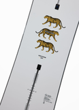 Close-up of Burton Process 2024 snowboard topsheet featuring triple tiger artwork and clean white finish, designed for freestyle riders seeking powerful pop, control, and all-mountain versatility