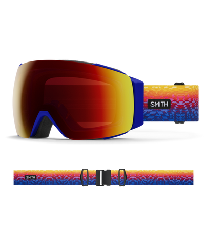 Smith I/O MAG Justin Lovato Red Snow Goggles with ChromaPop Sun Red Mirror lens: artistic red, yellow, and blue gradient strap for bold mountain style. Offers quick MAG lens interchange, anti-fog tech, and superior peripheral vision