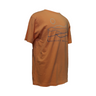 Angled view of coral Wachusett Mountain t-shirt showing blue mountain line-art and sun design across the back, highlighting soft cotton fabric and relaxed fit