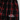 Close-up of red and black plaid Wachusett Mountain flannel pants featuring embroidered white logo and drawstring waistband